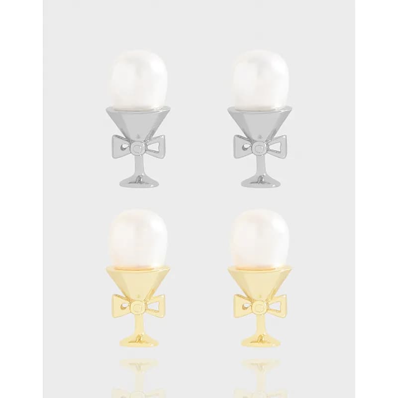 Polished sterling silver earrings with pearl toppers and martini-glass charms with bows