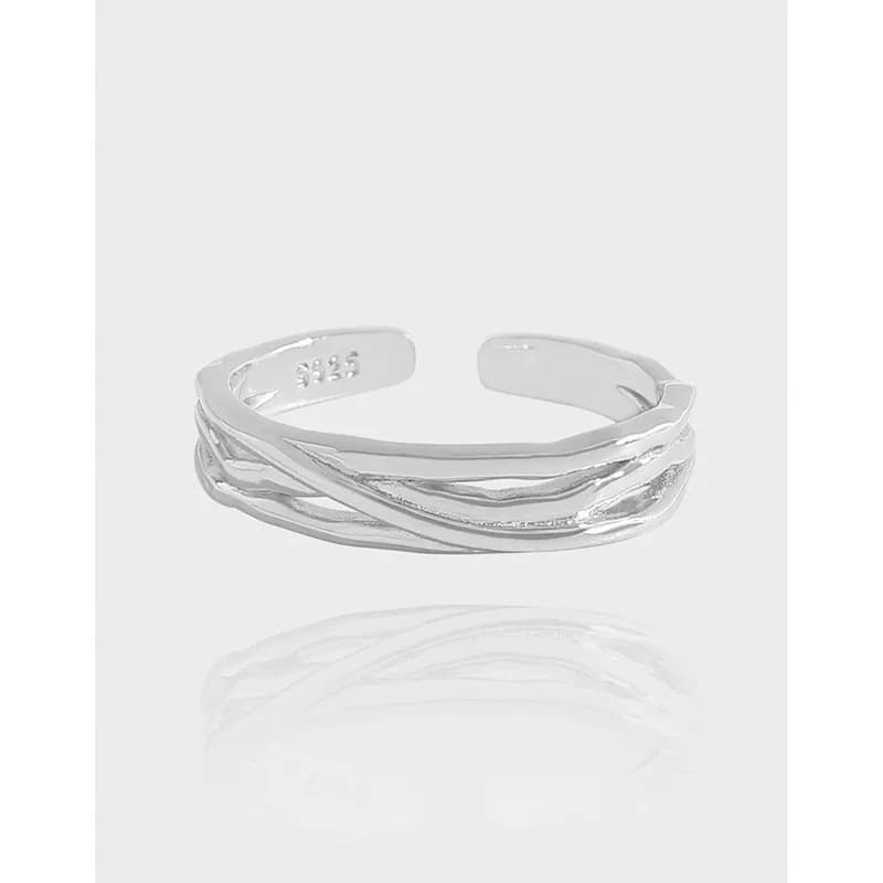 Polished sterling silver ring with multiple intertwined bands forming a braided, open-style design.