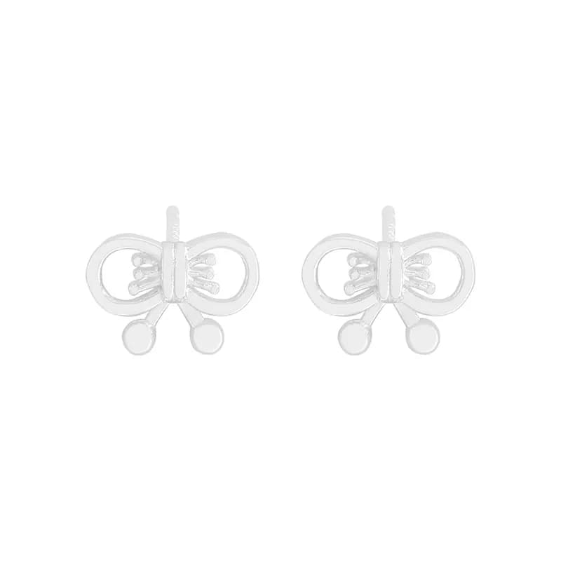 Bow Motif Earrings in Silver — Sterling silver
