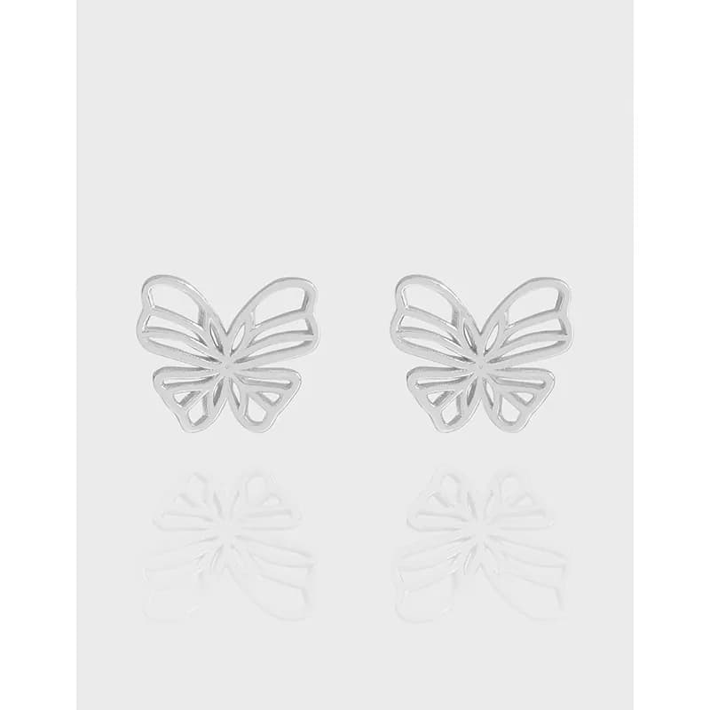 Pair of polished sterling silver butterfly cutout stud earrings.