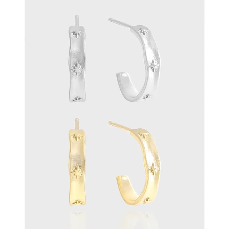 Polished silver hoop earrings in a curved rectangular bar shape with starburst motifs, shown in front and side views (gold version also shown).