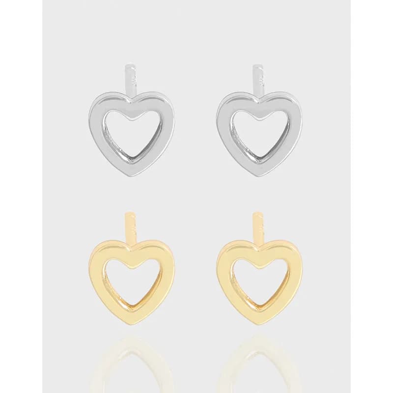 Pair of polished heart outline stud earrings in silver with a gold-tone option, shown front-facing