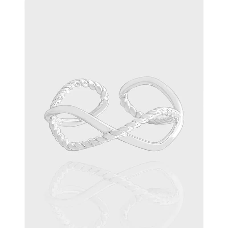 Polished sterling silver interlocking loop ring with a twisted rope detail