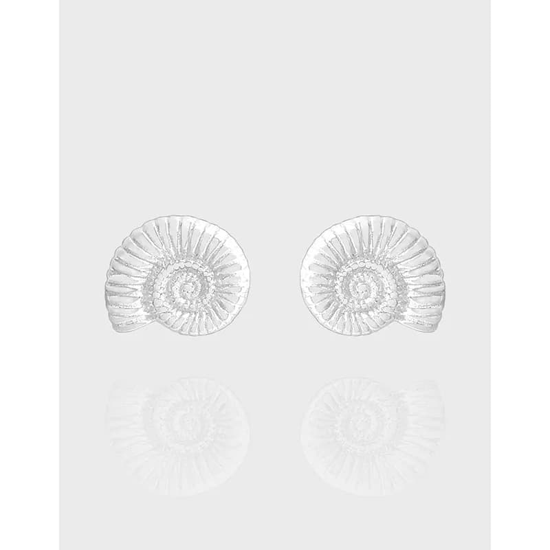 Polished sterling silver spiral shell stud earrings with ribbed circular design.