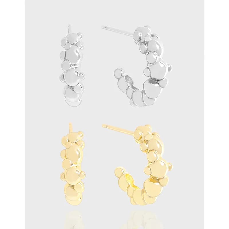 Polished bubble-disc hoop earring in silver finish with stacked circular discs