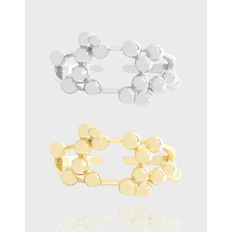 Polished double-row bubble circle ring with circular beads on a slim band, shown in silver and gold-tone versions.