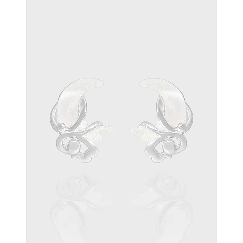 Polished sterling silver Crescent Leaf Earrings displayed against a light background.