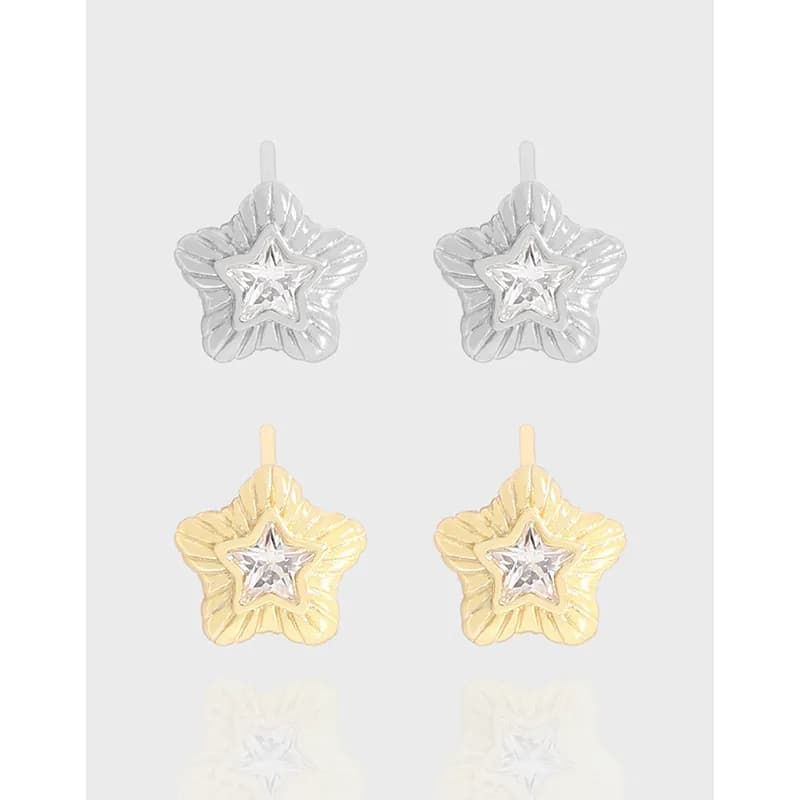 Pair of starflower stud earrings in polished silver.