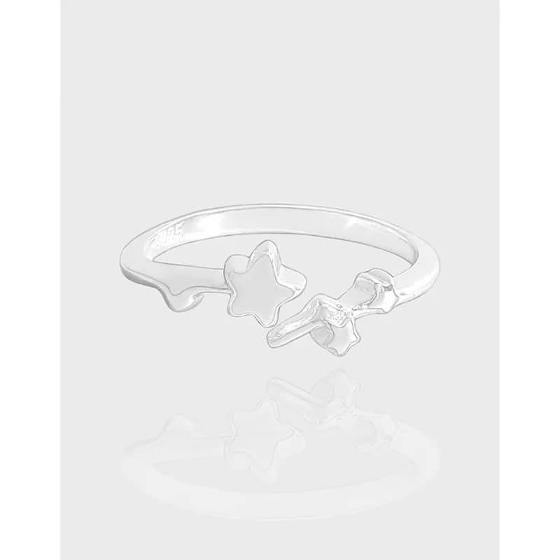 Polished sterling silver open ring with two star motifs along a slim band.