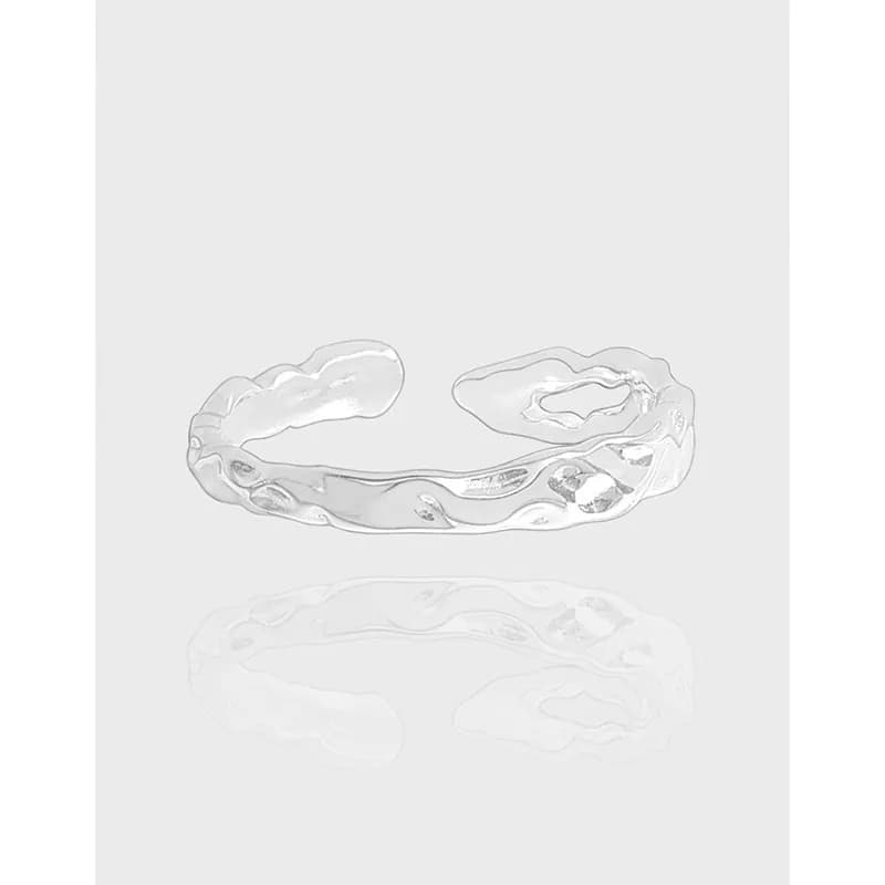 Polished sterling silver open-ended ring with a wavy, organic band silhouette