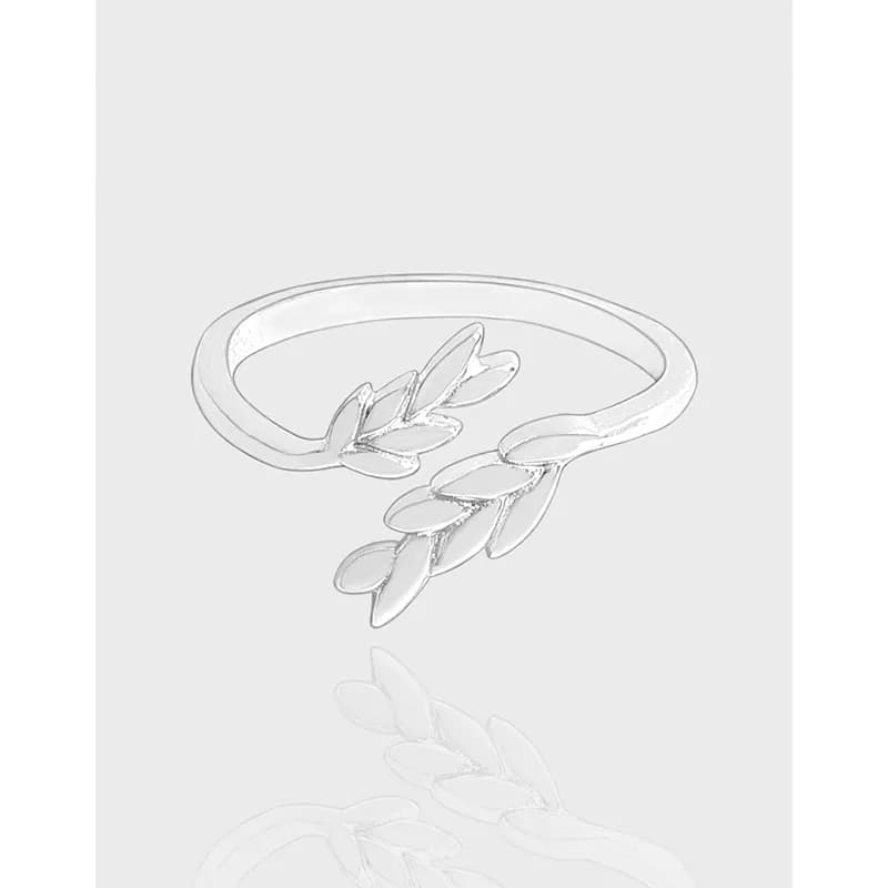 Polished Sterling Silver Leaf Wrap Ring with an open band and overlapping leaf embellishments.