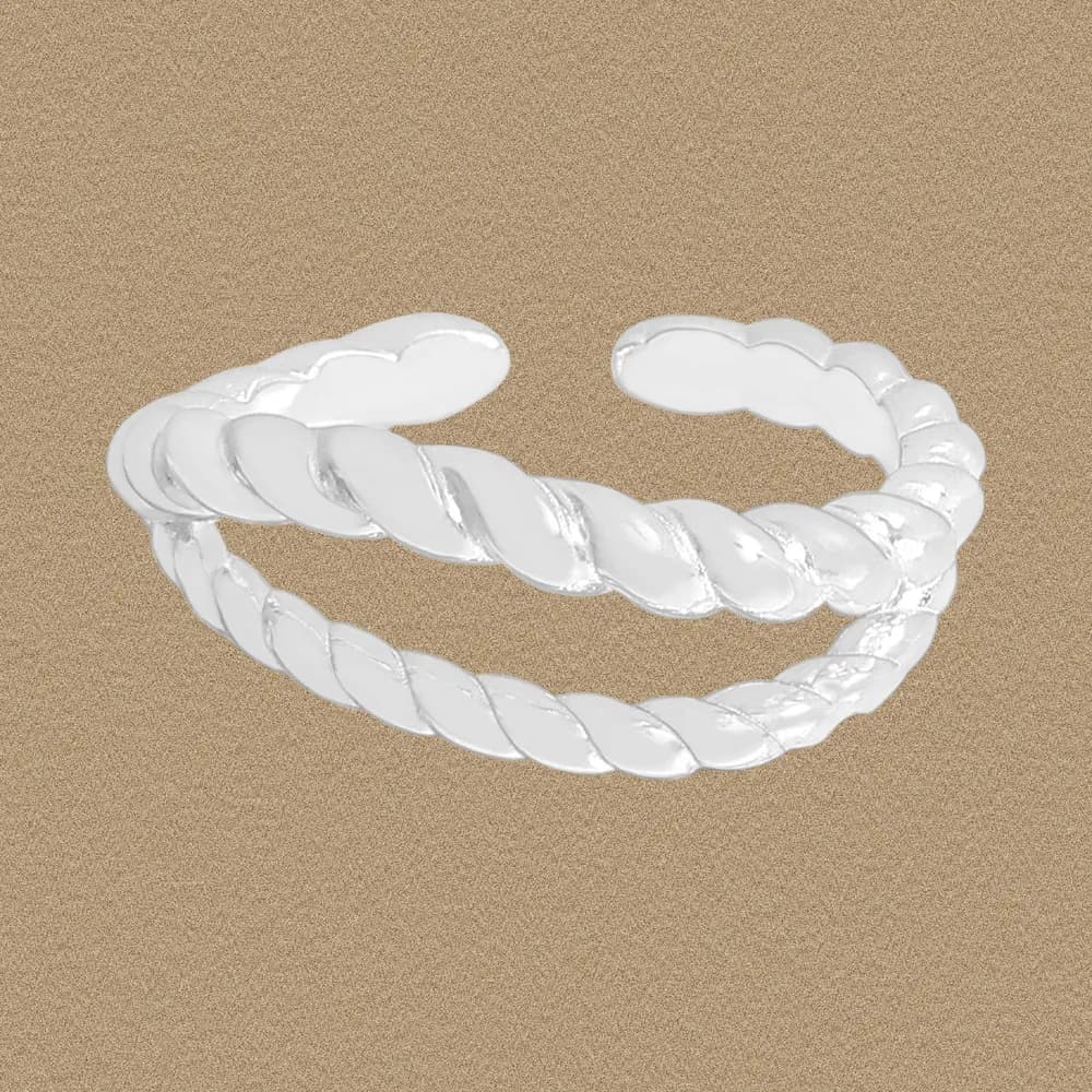 Open double-band twisted rope ring in polished sterling silver on a neutral background.