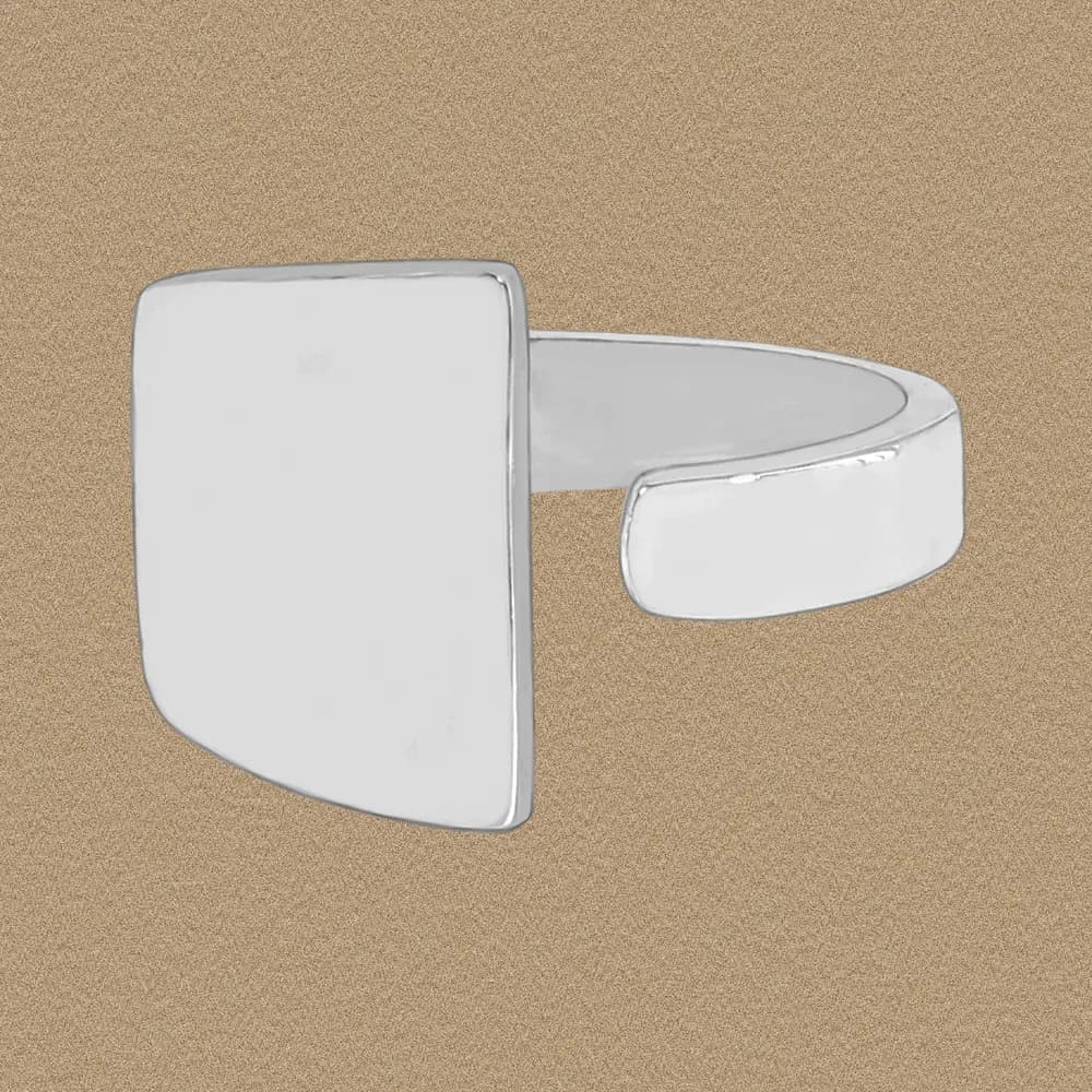 Polished sterling silver ring with a flat square plate and rounded edges on a neutral background.