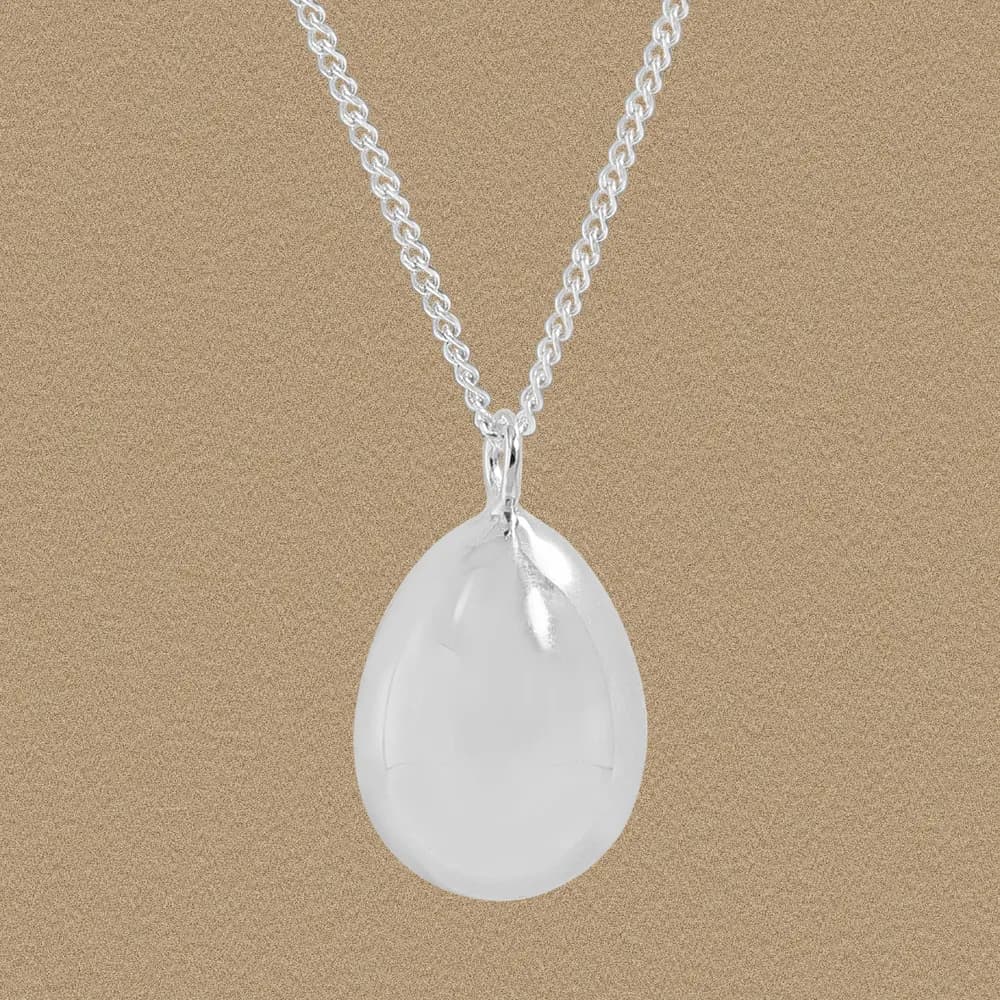 Polished sterling silver teardrop pendant on a chain
