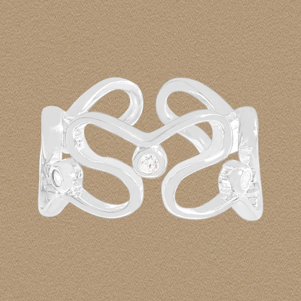 Polished sterling silver ring with an open double-loop infinity motif and a small central gemstone.