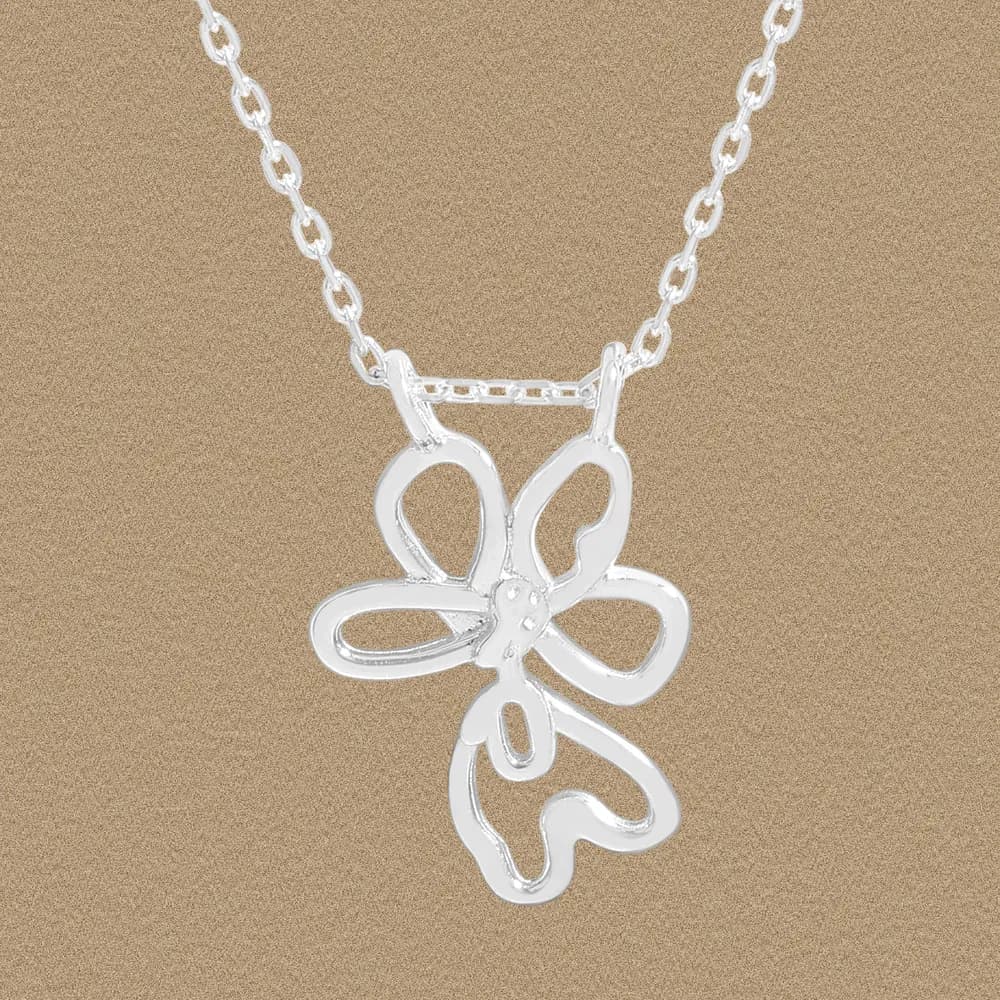 Sterling silver flower-petal pendant on a polished chain against a beige background.