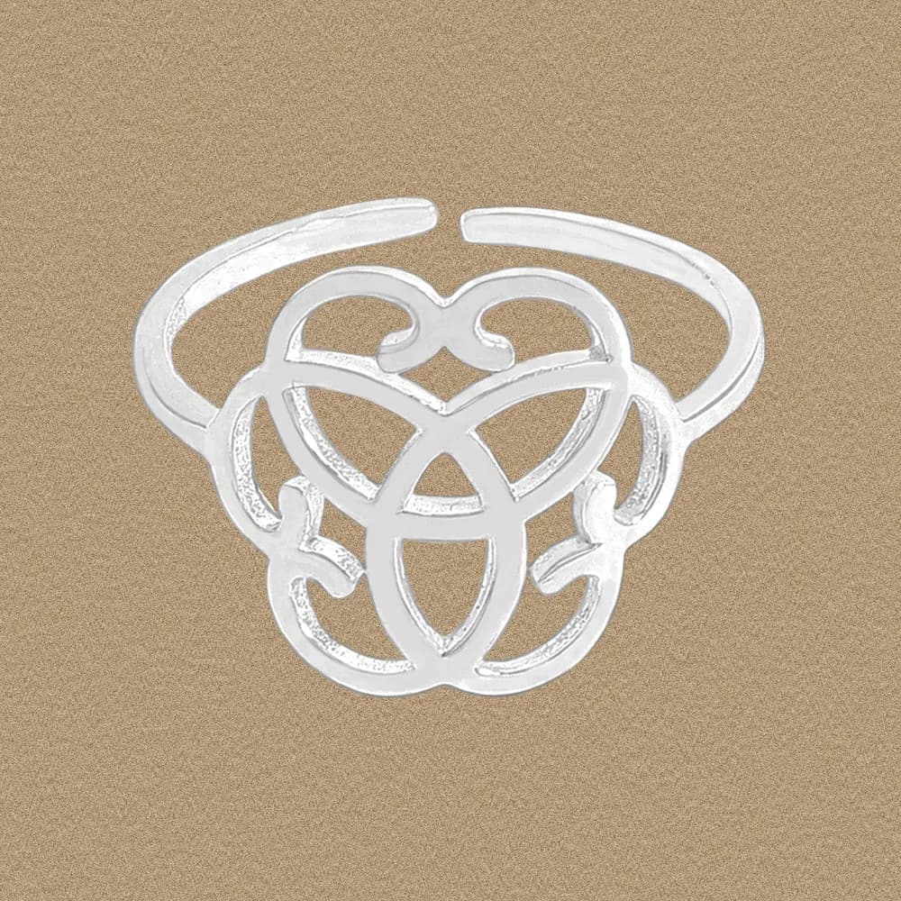 Polished sterling silver Celtic knot ring with an openwork interlaced design on a neutral background.