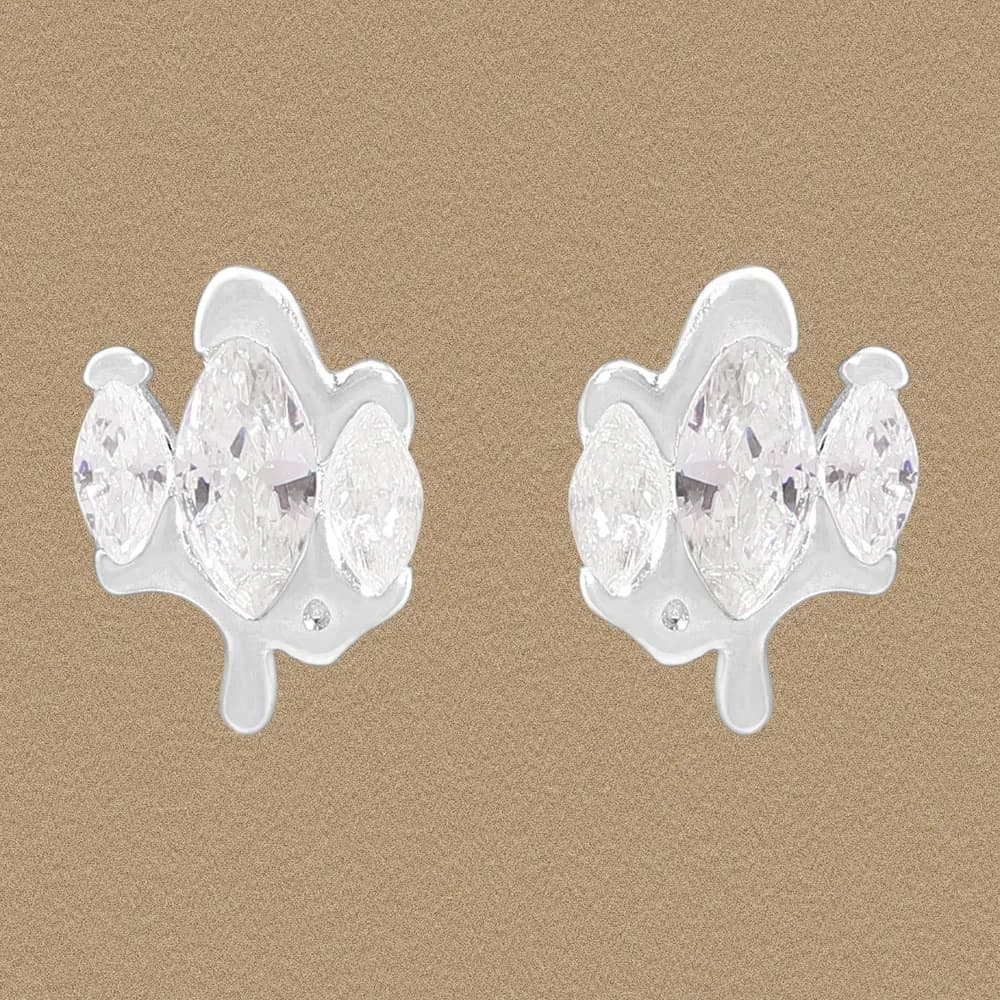 Sterling silver earrings with crystal cluster in a leaf-like, curved design on a beige background.