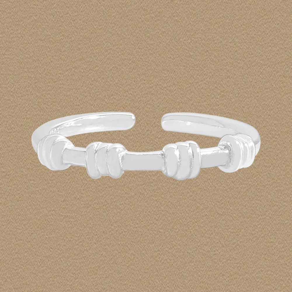 Polished sterling silver open-band ring with ribbed bead knots on each side