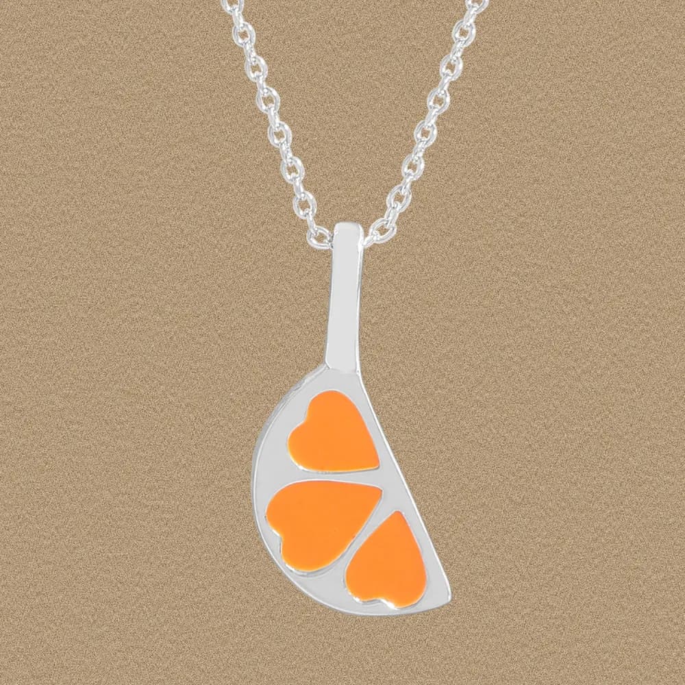 Polished sterling silver pendant with three orange enamel hearts on a delicate chain.