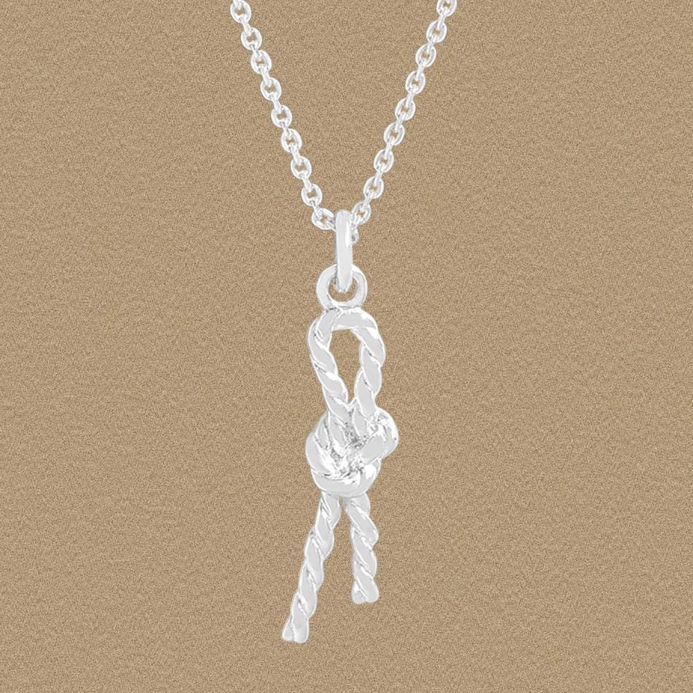 Polished sterling silver rope-knot pendant on a delicate chain