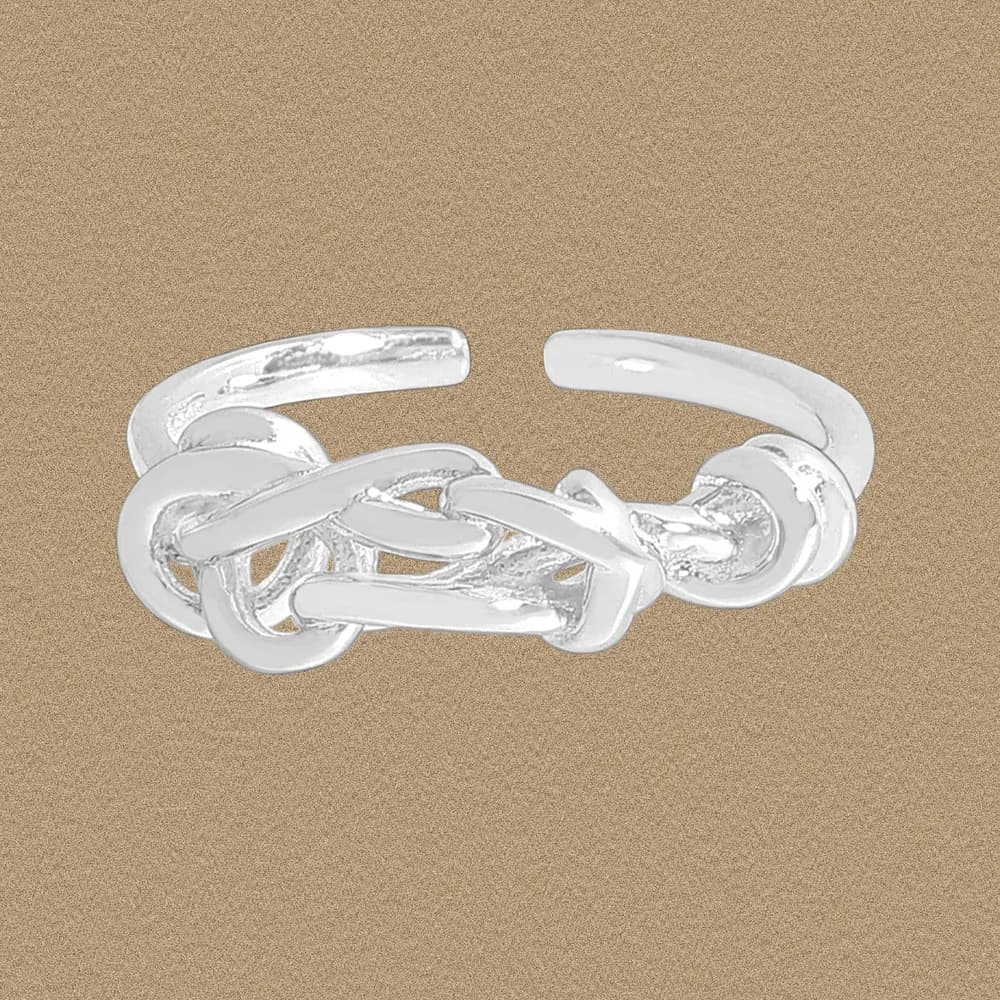 Polished sterling silver open-ring with a knot of interlocking links centered on the band.