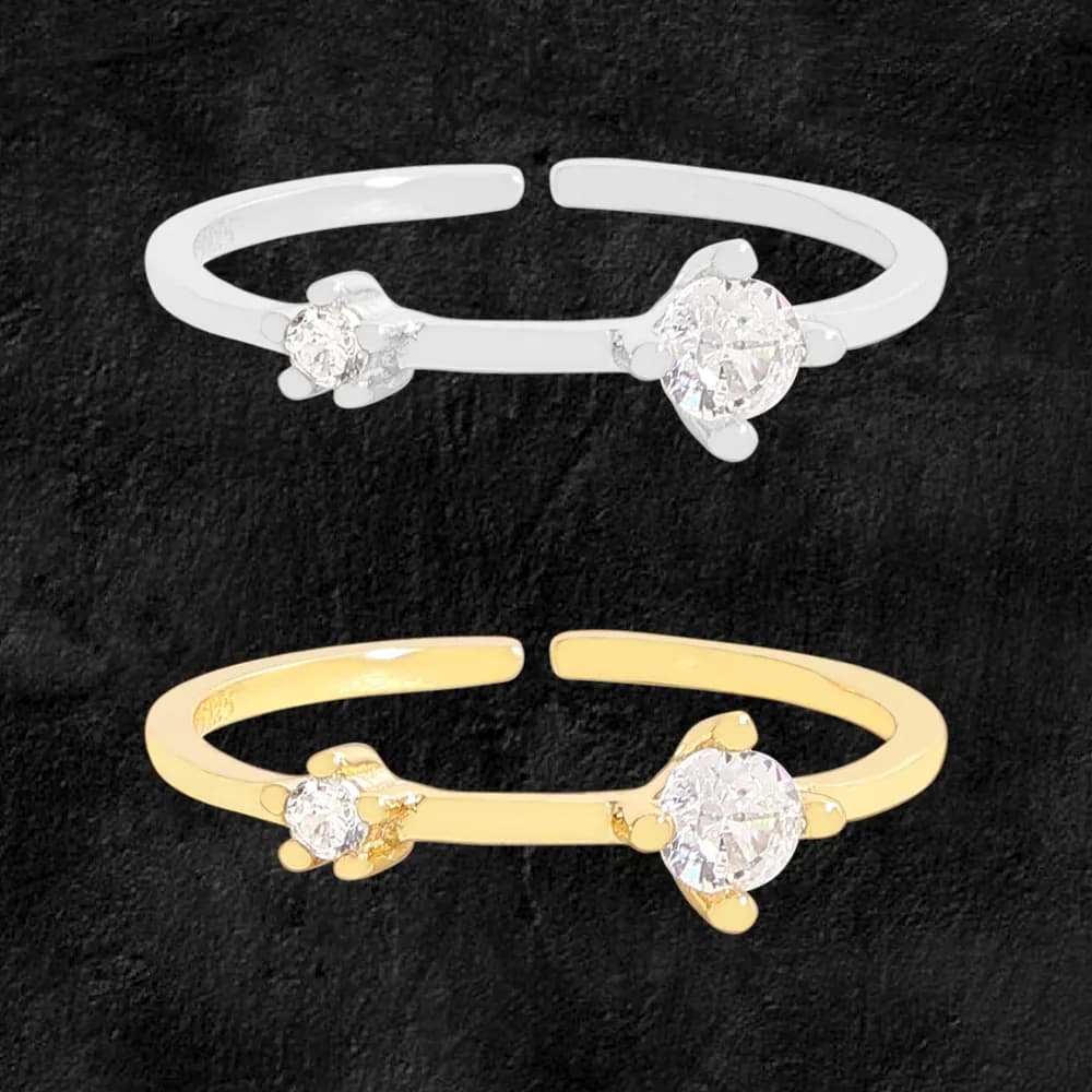 Polished sterling silver open-ended ring with two floral diamond clusters on each end.