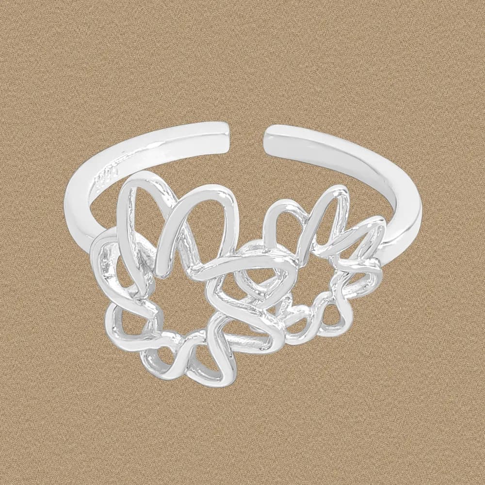 Polished sterling silver ring with intertwined looping arches forming an openwork centerpiece.