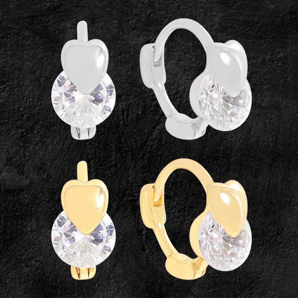 Polished heart stud with a round crystal drop earring in silver and gold tones on a dark background.