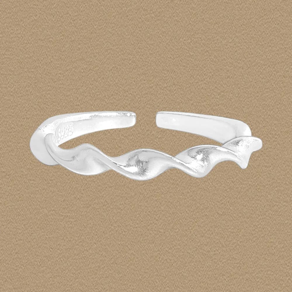 Open-cuff sterling silver ring with a twisting wave design
