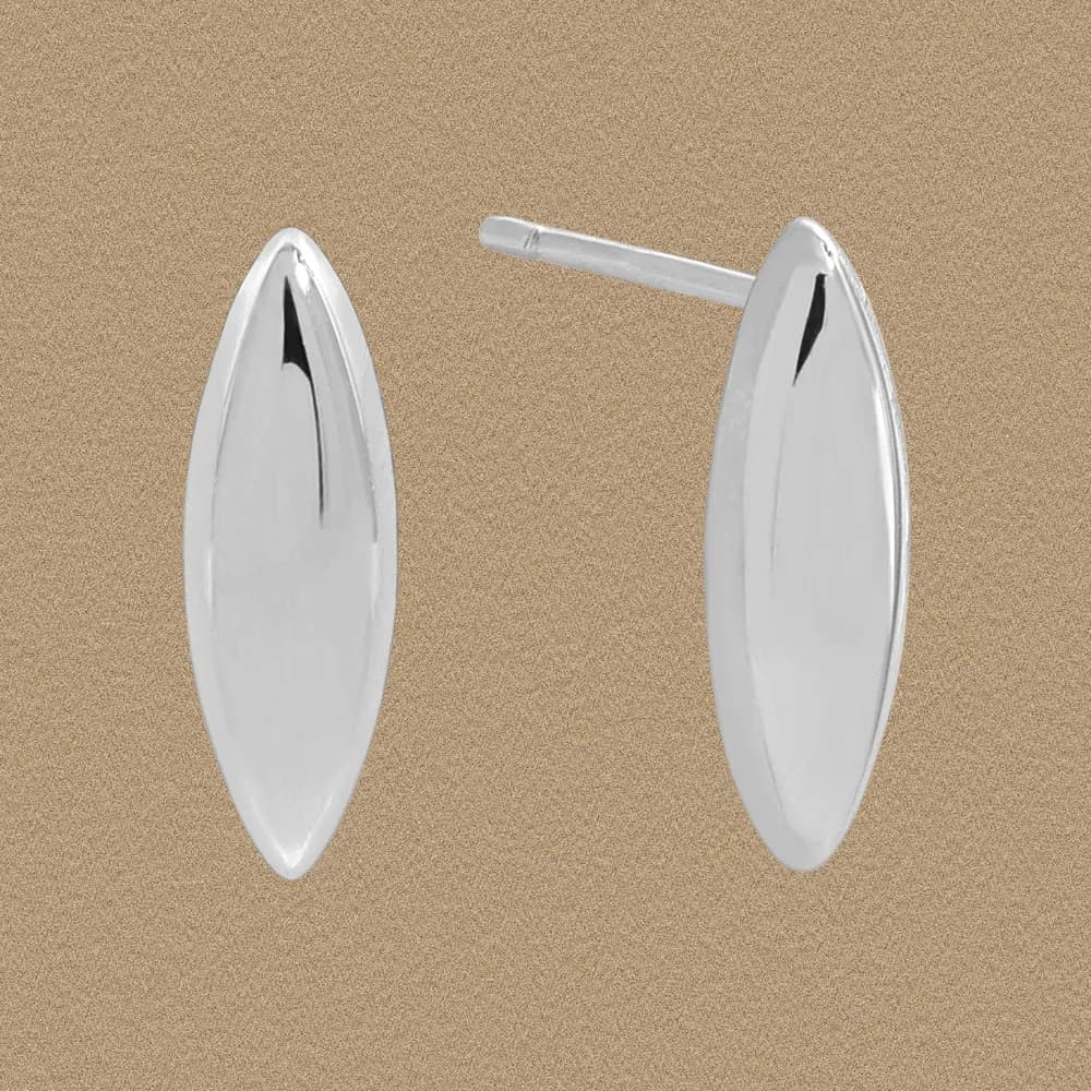 Polished sterling silver elongated oval stud earrings on a neutral background.