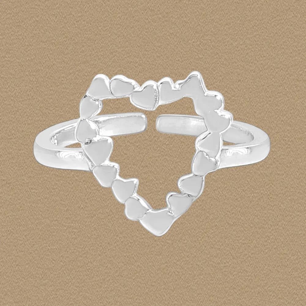 Polished sterling silver ring showing an open heart silhouette made of connected small hearts.