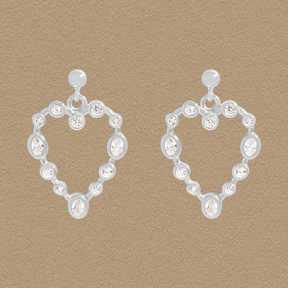 Sterling silver heart-shaped circular hoop earrings with small round stones.