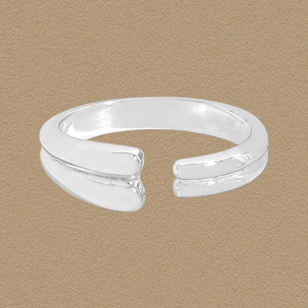 Polished sterling silver open cuff ring with rounded ends and a small gap