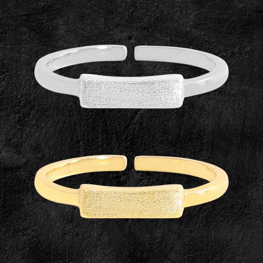Open-adjustable textured bar ring displayed in silver and gold-tone finishes.