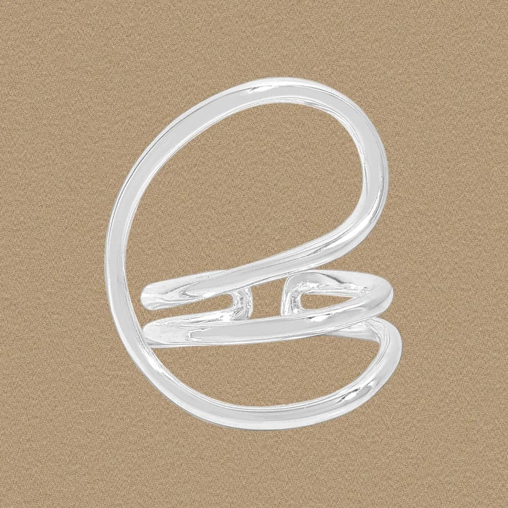 Polished sterling silver open loop ring with a curved, wrapped band on a sand-toned background.