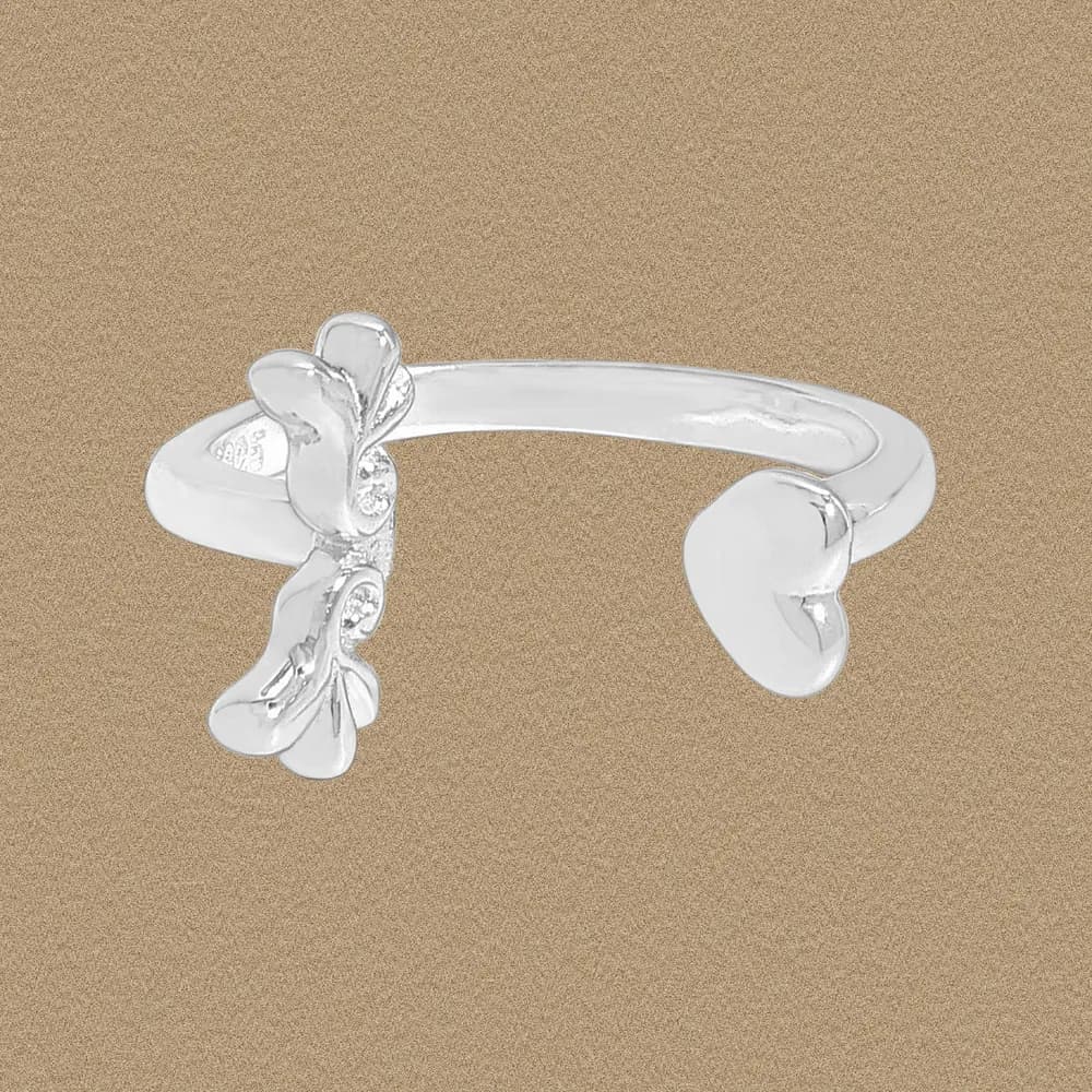 Polished sterling silver open ring with petal clusters at each end