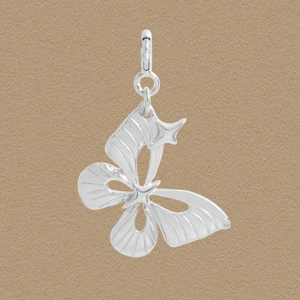 Polished sterling silver butterfly charm pendant with a loop bail and circular connector against a neutral background.