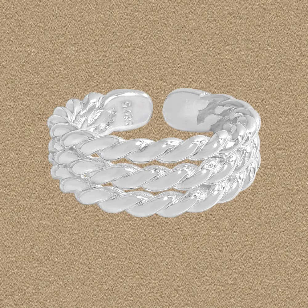 Polished sterling silver triple-rope ring showcase with three intertwined bands