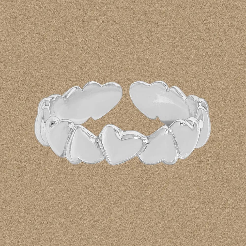 Polished sterling silver ring with connected heart-shaped links forming a continuous band.